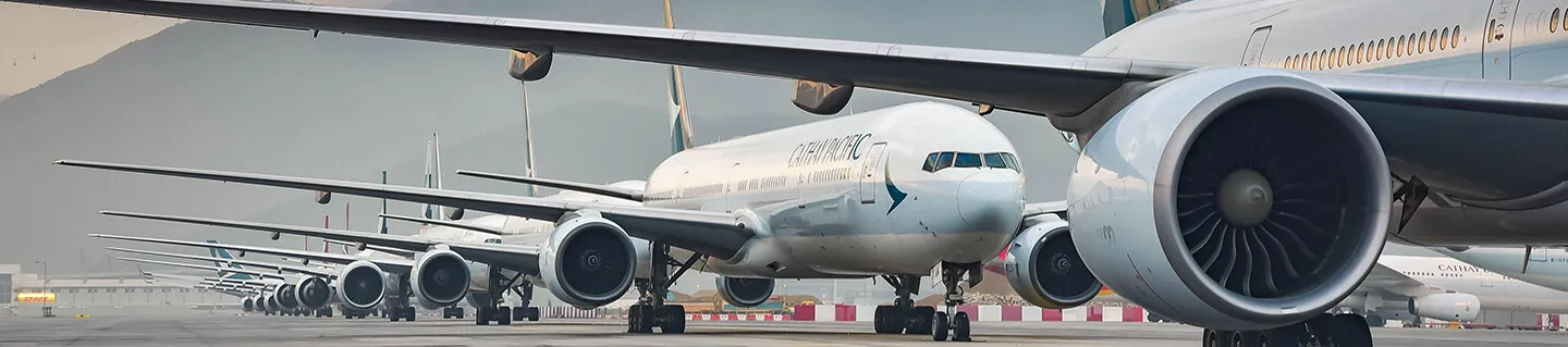 showing an airplane flying through clear skies above cloud icons, representing performance engineering and cloud optimization