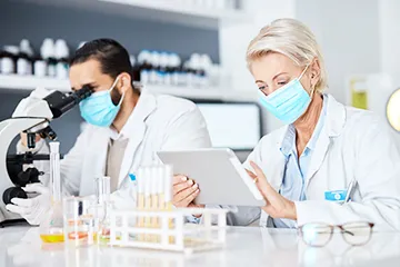 Fortune 500 pharmaceutical company logo representing HCL BigFix success in intelligent automation for infrastructure monitoring